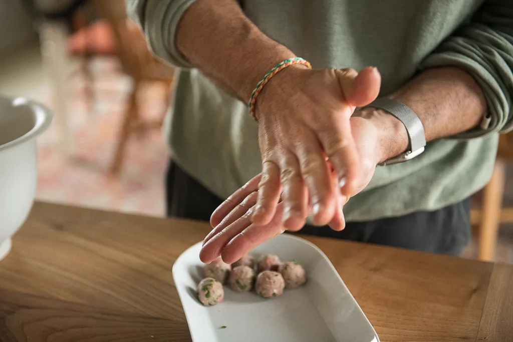 rolling meatballs